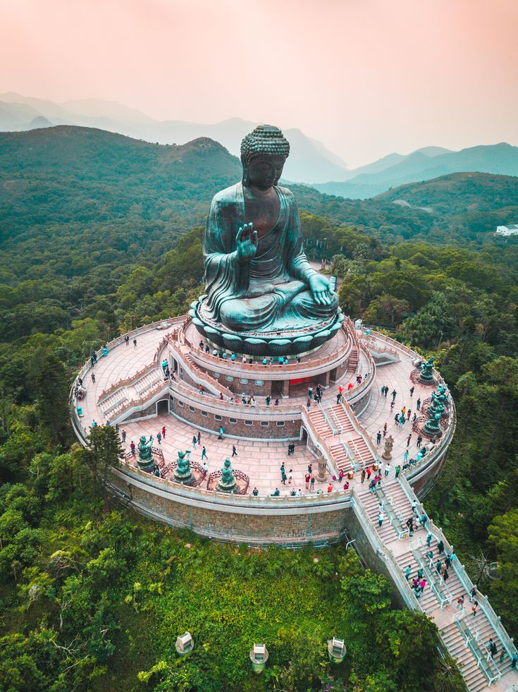 Tian Tan Buddha, Hong Kong Photo by Jason Cooper #buddha #travel #Asia #Hongkong #landscape #spirituality #faith #peace #meditation #visit #travelinspiration #pinklandscape #greenlandscape #buddhainmountain